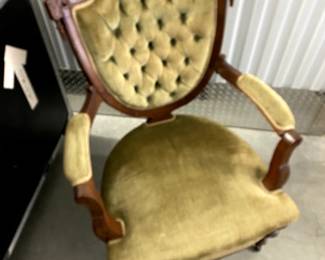 Tufted antique chair
