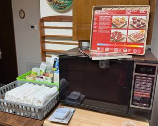 Microwave, cookbook, towels, light bulbs