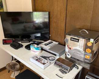 TV, Heated blanket, alarm clock radio, DVD player, fan more...