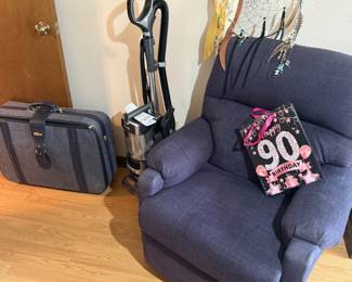 Suitcase, Vacuum Not for sale--, recliner