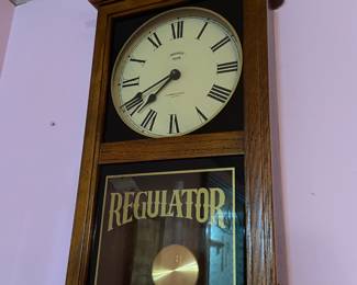 Regulator battery clock