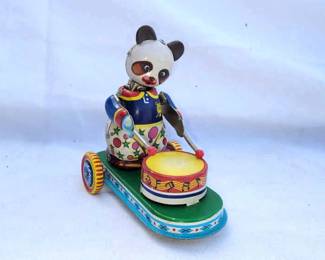 Tin Panda Playing Drums