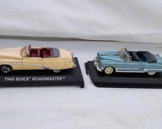 Two Vintage Replica Cars on Base	