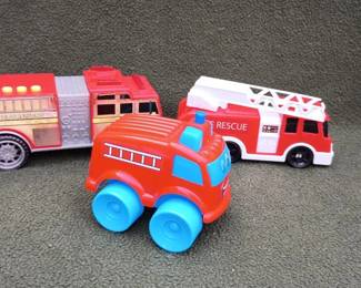Three Toy Fire Engines