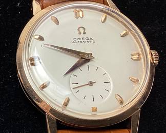 VINTAGE 18kt ROSE GOLD OMEGA AUTOMATIC MENS WATCH w BROWN LEATHER BAND. WATCH RECENTLY SERVICED IN GOOD WORKING CONDITION. 17 JEWELS