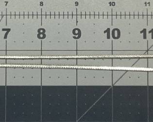 STERLING SILVER BALL LOCKET WITH 30 INCH CHAIN MEXICO STERLING SILVER BALL LOCKET OPENS 5 INCHES TO EXPOSE 6 SPACES. IT IS HUNG BY A 30 INCH BRAIDED HERRINGBONE NECKLACE