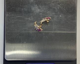 10K RUBY AND DIAMOND EARRINGS 2.7 GRAMS 10KYG RUBIES AND DIAMOND EARRINGS. 6-15PT MARQUISE CUT RUBIES