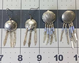 STERLING SILVER SOUTHWESTERN EARRING LOT TWO PAIR OF SOUTHWESTERN INSPIRED EARRINGS WITH TOTAL WEIGHT 9.71 GRAMS. (ONE SILVER TASSEL MISSING ON EAGLE AND STONE PAIR)