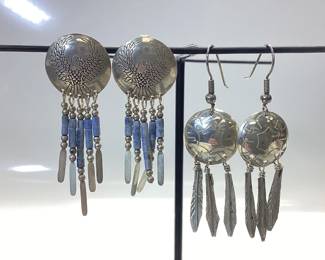 STERLING SILVER SOUTHWESTERN EARRING LOT TWO PAIR OF SOUTHWESTERN INSPIRED EARRINGS WITH TOTAL WEIGHT 9.71 GRAMS. (ONE SILVER TASSEL MISSING ON EAGLE AND STONE PAIR)