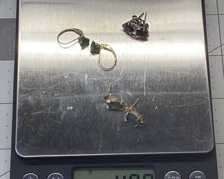 GARNET, SPINEL, OPAL EARRING LOT 14K YELLOW AND WHITE GOLD EARRINGS. TWO 1+CARAT GARNETS SET IN 14K WHITE GOLD. TWO 3/4 CARAT GREEN SPINELS IN 14K YELLOW GOLD SPRING BACK HOOPS. PAIR OF LARGE OPALS SET IN 14K YELLOW GOLD. CARAT SIZES ARE APPROXIMATE. TOTAL COMBINED WEIGHT IS 4.09 GRAMS