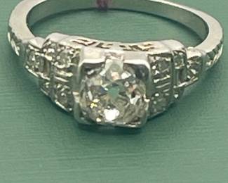 Antique platinum ring featuring 1.07 old mine cut diamonds - size 5 1/2.