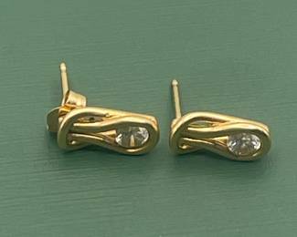 14 kt yellow gold and diamond earrings.  Carat weight is approximately 0.5 carats.