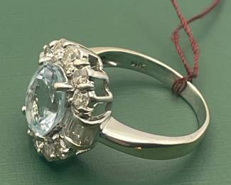 1950's 18 kt white gold ring featuring a 2.5 carat topaz center stone and 2 carats of diamond accents - size 7.5