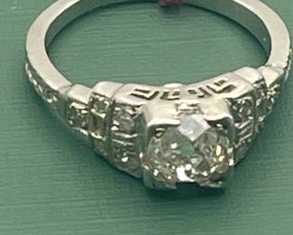 Antique platinum ring featuring 1.07 old mine cut diamonds - size 5 1/2.