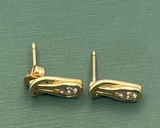 14 kt yellow gold and diamond earrings.  Carat weight is approximately 0.5 carats.