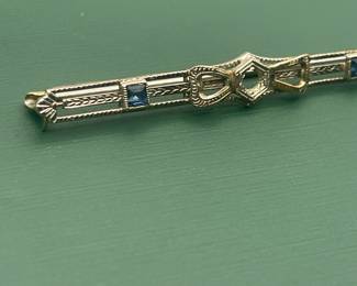 Antique 10kt white gold and sapphire bar pin.