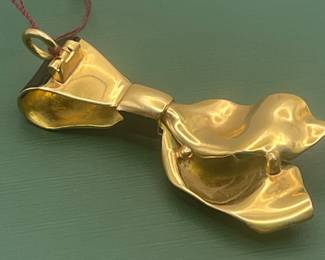 Antique 14 kt yellow gold, black enamel and diamond pendant.