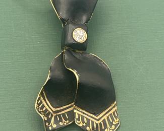 Antique 14 kt yellow gold, black enamel and diamond pendant.