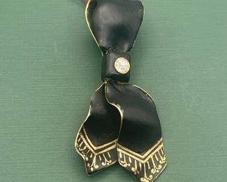 Antique 14 kt yellow gold, black enamel and diamond pendant.