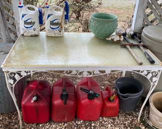 Outdoor Metal Table with Glass Top/Gas Cans