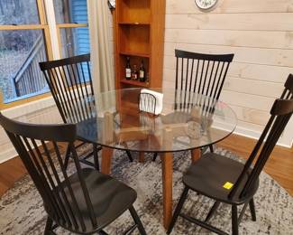 Crate and Barrel 48" round table with 4 chairs. $3000 new. Table $375 today. Chairs are $75 each. 