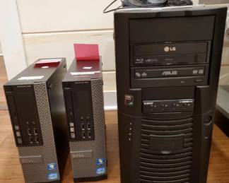 Two Dell Optiplex Desktop PCs and one Antec case with no motherboard.