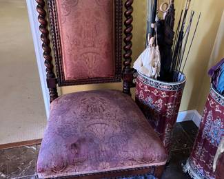 Gothic revival walnut side chair on casters