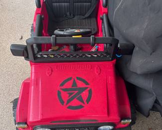 Kids electric power ride along with charger. Plays music, has USB port