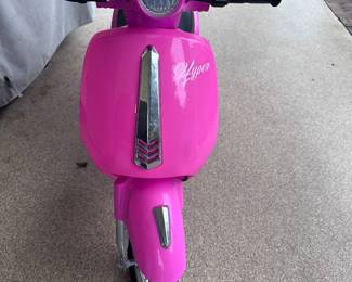 This scooter is powered by charging(included) make your lil girl jump for joy when she sees this for Christmas!