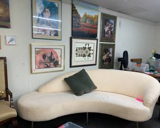 Curved sofa, Framed art