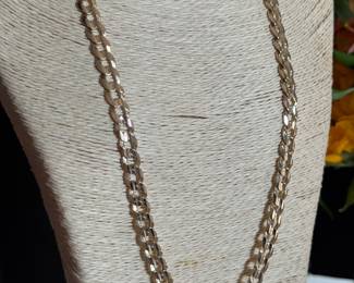 #138 - 23 1/2 " cuban link chain 10kt gold 46.8 grs. 