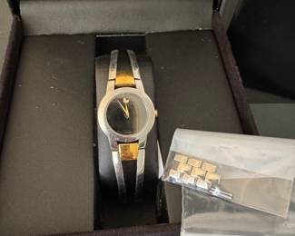 #42 - $200 - Movado Amoroso onnyx face ladies watch, original box included. 