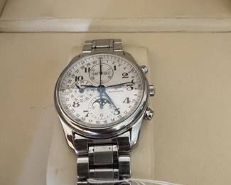 #41- $1,600 - Longines Automatic men or unisex moonphase winding moon stainless steel , original box included. 