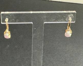 #71 - $150 pair of opal earrings on 10kt gold setting. 