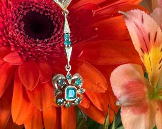 #126 - $1,200 - Emerald on 18kt gold earrings dangling 6.0 grs. 