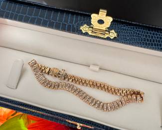 #122 - 3 ctw tennis diamond bracelet 14kt. 15.5 gr. size 7 3/4" - $1650. 