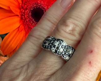 #116 - $600 - Levian black & white diamond "Bow" ring 14kt. 5.4 grs. Size 7 