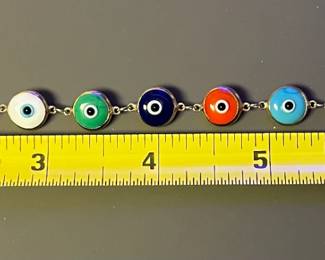 #146 -$200 - 14kt gold Evil eye glass bracelet - 