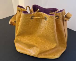 #56 - Louis Vuitton yellow Epi bucket bag 8"x10" $595