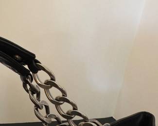 #54 - Chanel matellassee horse hair black purse $1000