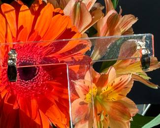 #125 - $325 - peridot & diamond earrings on 14kt yellow gold. 2.0 grs.