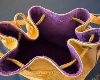 #56 - Louis Vuitton yellow Epi bucket bag 8"x10" $595