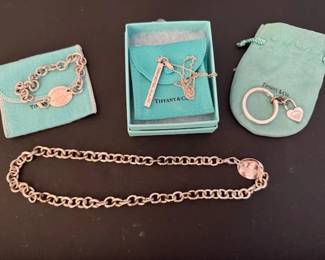 #174 - Tiffany & Co jewelry sterling : $110 - Tiffany & Co 1837 Bar Pendant Necklace. Sterling Silver 925, Ca. 2001, $60 - Tiffany key chain with heart charm. Tiffany matching bracelet & necklace priced separately. 