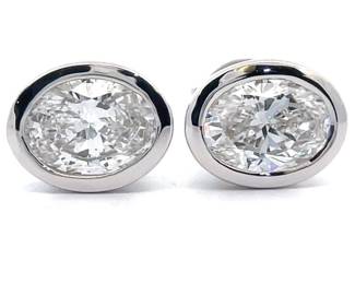 Modern 2 Carat Diamond Oval Bezel Solitaire Stud Earrings in 14k White Gold