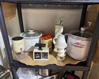 Lots of small kitchen appliances, many new and never used