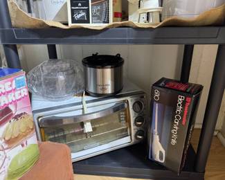 Lots of small kitchen appliances, many new and never used