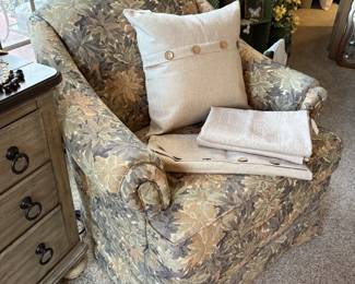 One of several comfy upholstered occasional chairs.