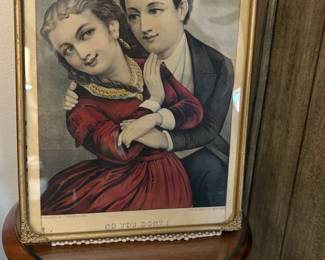 Currier and Ives print of a couple being romantically inclined.  She looks a bit coy however.