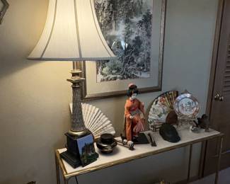 A view of the decorations in what we are calling the Asian room.  The table is more contemporary and would go with any decorative setting.