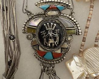 Wonderful vintage Zuni pendant ...we have cases full of sterling Native American jewelry.  Too much to show...